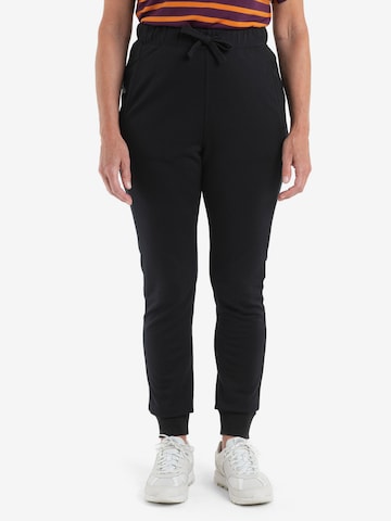 ICEBREAKER Tapered Trousers 'Crush II' in Black: front