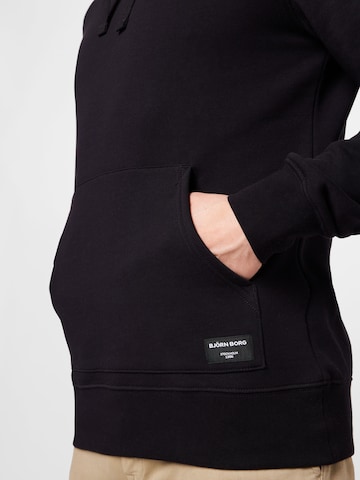 BJÖRN BORG - Sweatshirt de desporto 'Centre' em preto