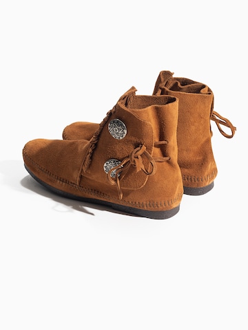 Minnetonka Kozaki w kolorze brązowy