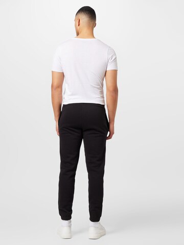 NEW ERA Regular Trousers in Black