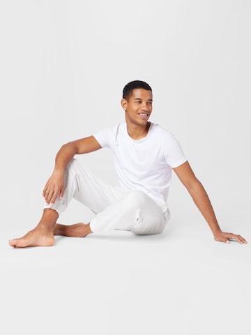 Calvin Klein Дънки Tapered Leg Панталон в бяло