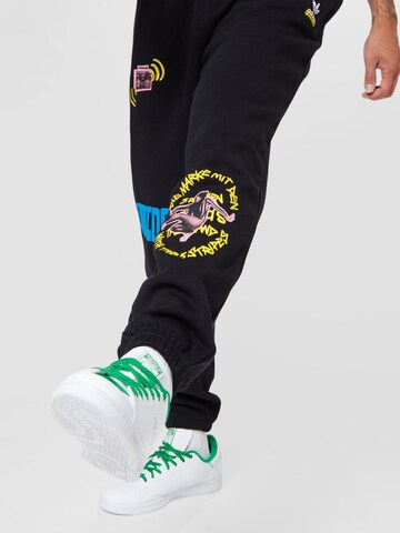 ADIDAS ORIGINALS Tapered Pants 'Graphics Unite Sweat' in Black