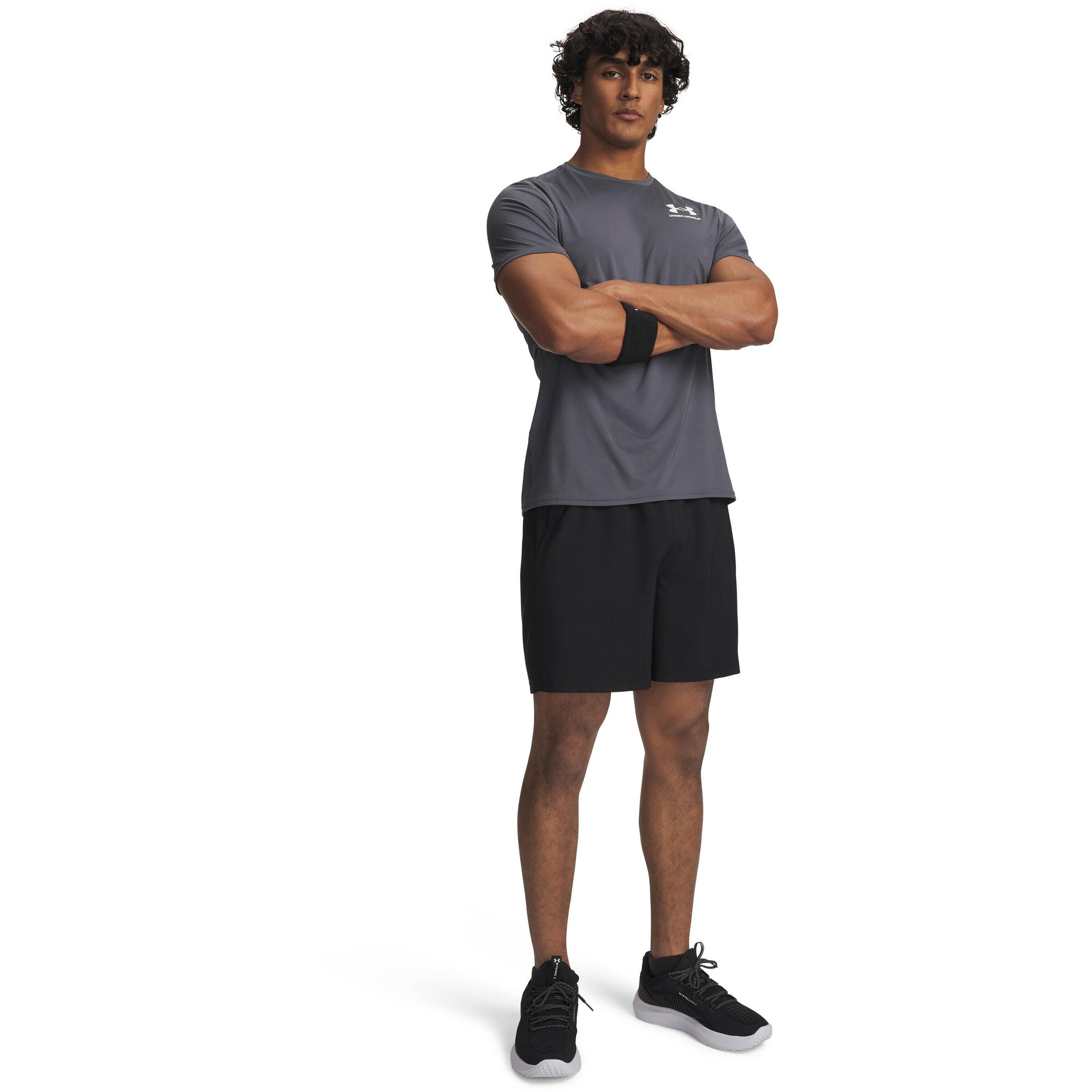 UNDER ARMOUR Regular Workout Pants in Black