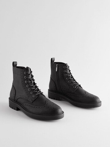 Boots stringati di Next in nero