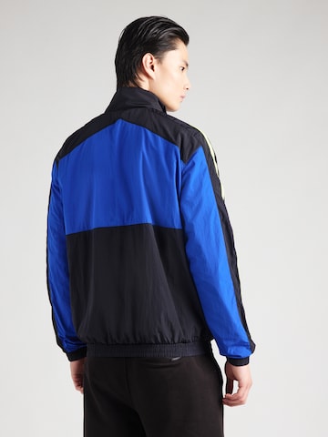Giacca sportiva di UNDER ARMOUR in nero