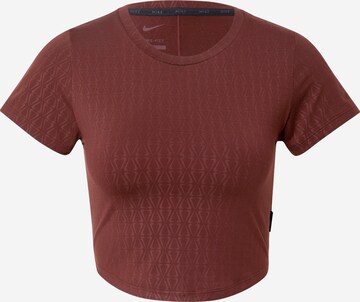 NIKE - Camiseta funcional 'One Luxe' en bronce: frente