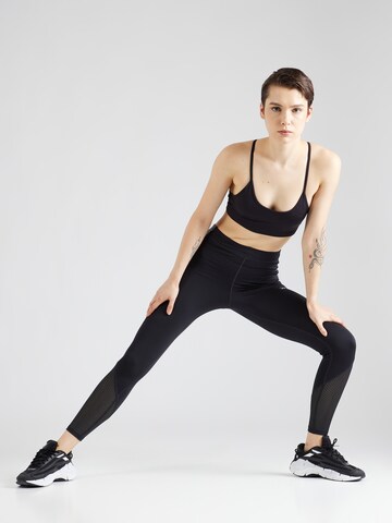 Skinny Pantaloni sport de la Reebok pe negru