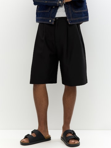 Baggy Pantaloni con pieghe di Pull&Bear in nero: frontale