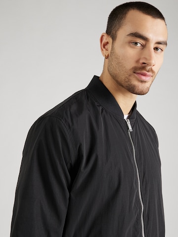 ABOUT YOU x Kevin Trapp Between-Season Jacket 'Robin' in Black