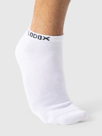 Chaussettes ' 3er Sneaker Socks ' Smilodox en blanc : devant