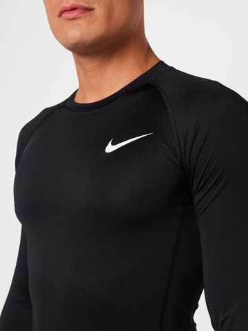 NIKE - Regular Fit Camisa funcionais em preto