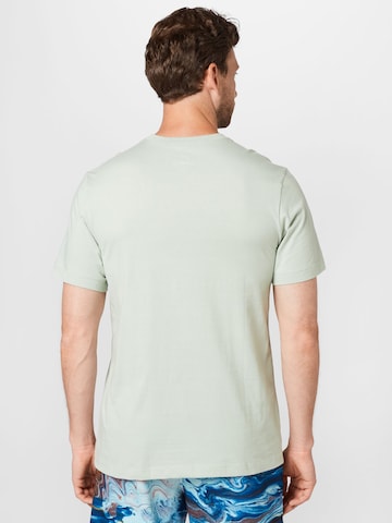 Nike Sportswear Regularny krój Koszulka 'Icon Futura' w kolorze zielony