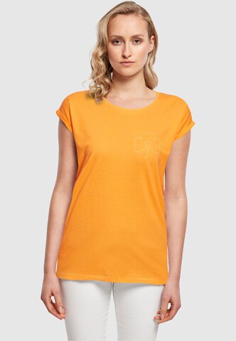 Merchcode Shirt 'Spring - Leaf Clover Flower' in Oranje: voorkant