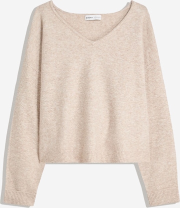 BershkaPulover - bež boja: prednji dio