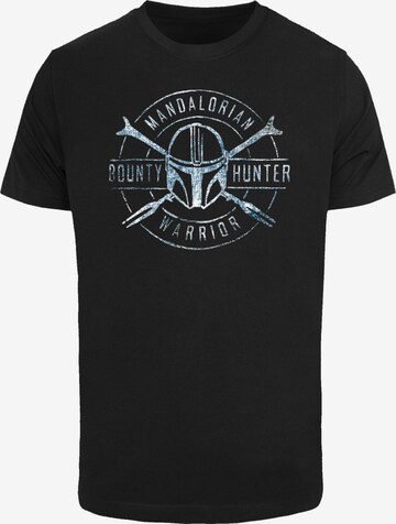 F4NT4STIC Shirt 'Star Wars The Mandalorian Bounty Hunter' in Zwart: voorkant