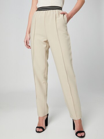 Guido Maria Kretschmer Women Regular Trousers with creases 'Eleni' in Beige: front