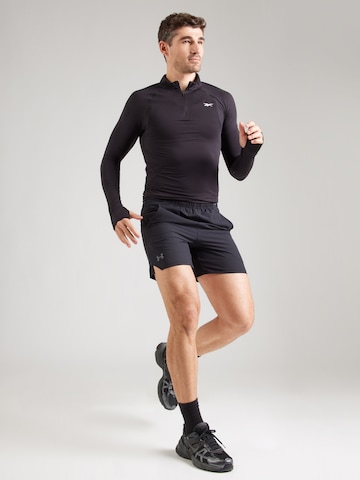 Regular Pantalon de sport 'Vanish' UNDER ARMOUR en noir