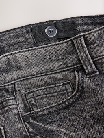 Next Skinny Jeans in Grau