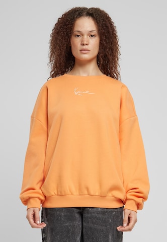 Sweat-shirt Karl Kani en orange : devant