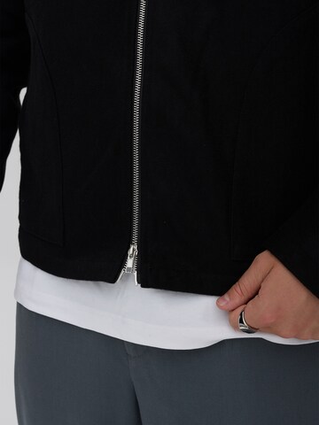 Dxnmxrk Winter jacket 'DXFynbar' in Black