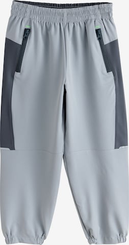 Next Tapered Housut värissä harmaa: etupuoli