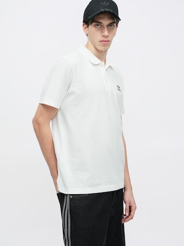 ADIDAS ORIGINALS Majica 'ESS' | črna barva