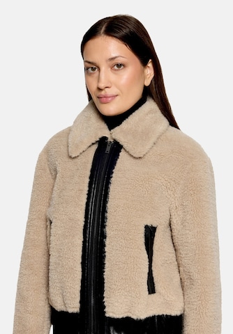 Amber & June Tussenjas in Beige
