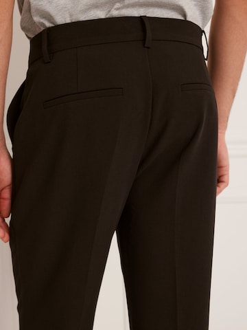 Guido Maria Kretschmer Men Regular Trousers with creases 'Julius' in Black