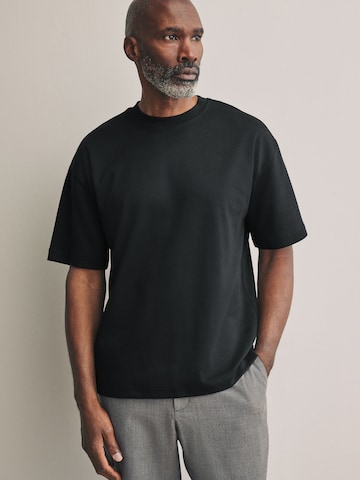 Tricou de la Next pe negru