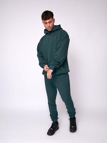 Fortex Fitness Trui 'Essential Oversized Hoodie' in Groen
