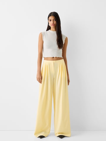 Bershka Wide Leg Plissert bukse i gul