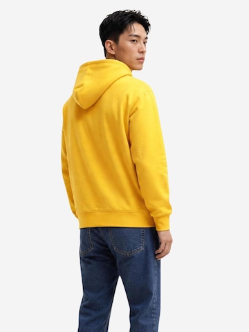 Sweat-shirt 'DM0DM23606' Tommy Jeans en jaune