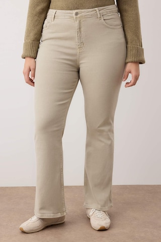 Trendyol Curve Boot cut Jeans in Beige: front