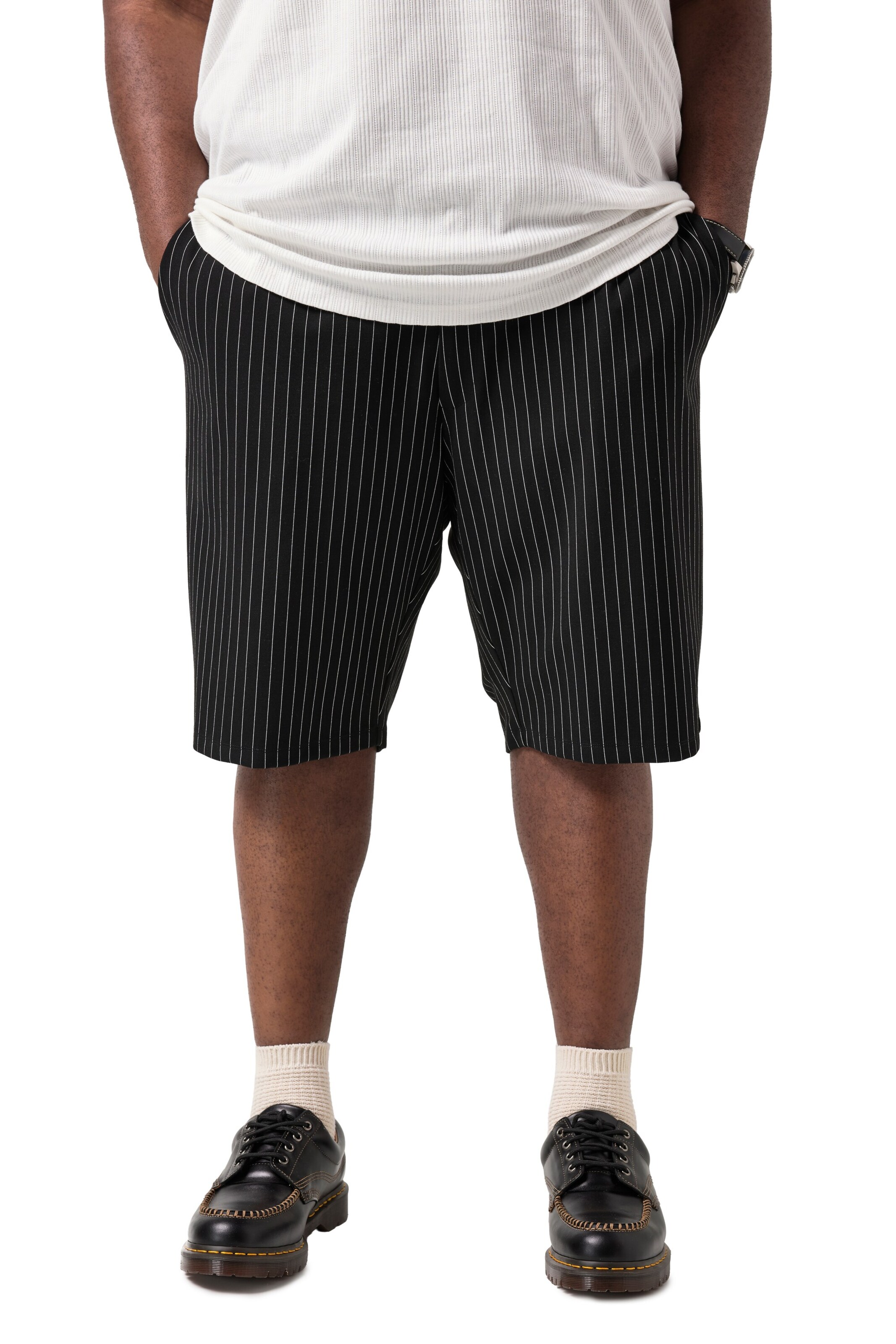 STHUGE Skinny Trousers in Black: front