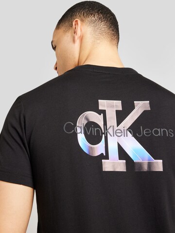 Calvin Klein Jeans Tričko 'EUPHORIC' – černá