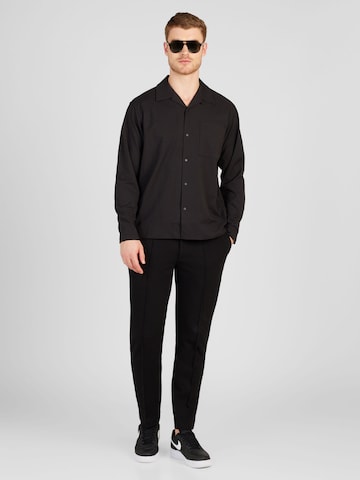 Coupe regular Chemise 'Carsten Solotex' NORSE PROJECTS en noir