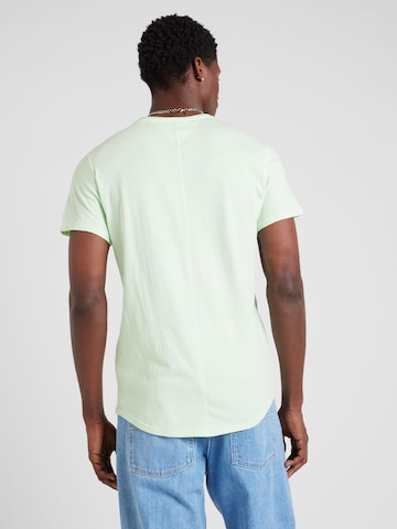 Tommy Jeans T-Shirt 'JASPE' in Grün