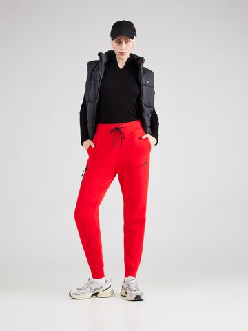 Nike Sportswear Конический (Tapered) Штаны 'TCH FLC' в Красный