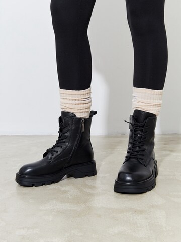 CESARE GASPARI Lace-up bootie in Black: front