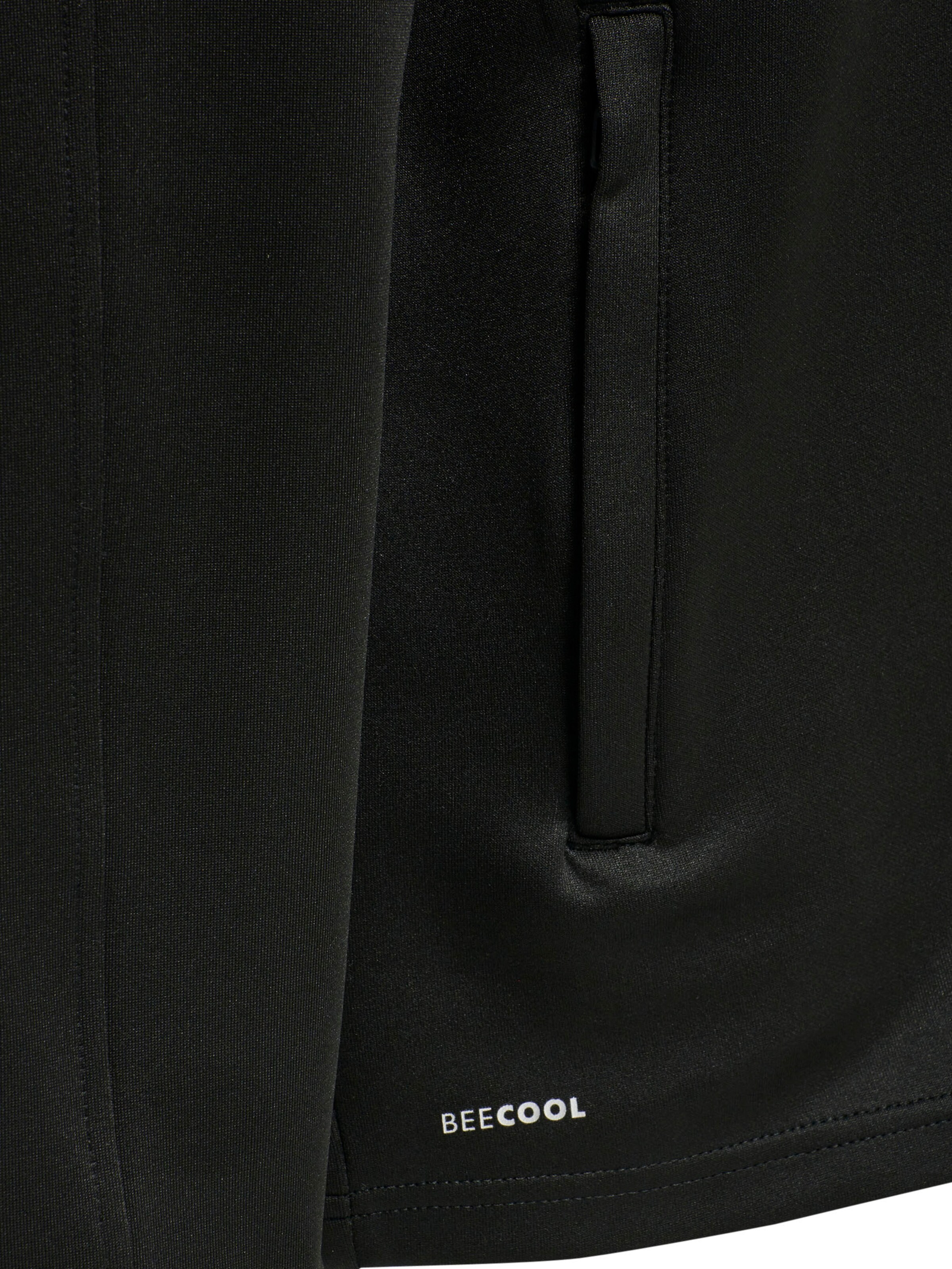 Veste de survêtement 'CORE XK POLY' Hummel en noir