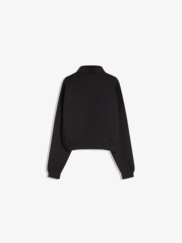 Hanorac de la Bershka pe negru