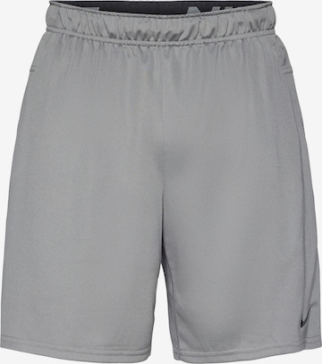 regular Pantaloni sportivi 'FLEX' di NIKE in grigio: frontale