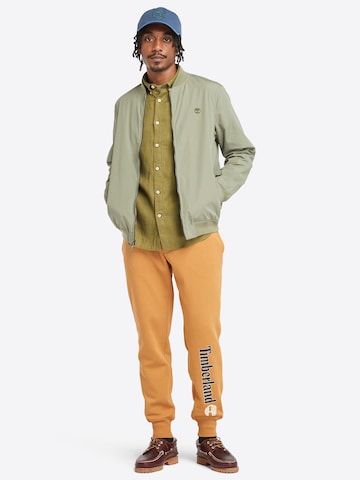 TIMBERLAND Zúžený Kalhoty – žlutá