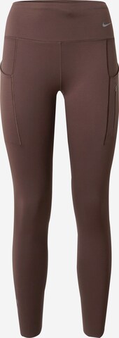 NIKE Skinny Workout Pants in Brown: front