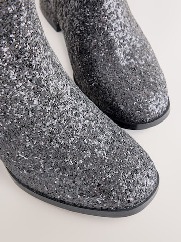 Bottes Next en noir
