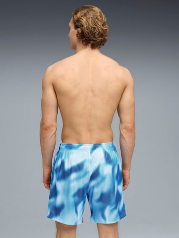 regular Pantaloni sportivi 'Puma Swim Men Printed Rasterized Mid Short' di PUMA in blu