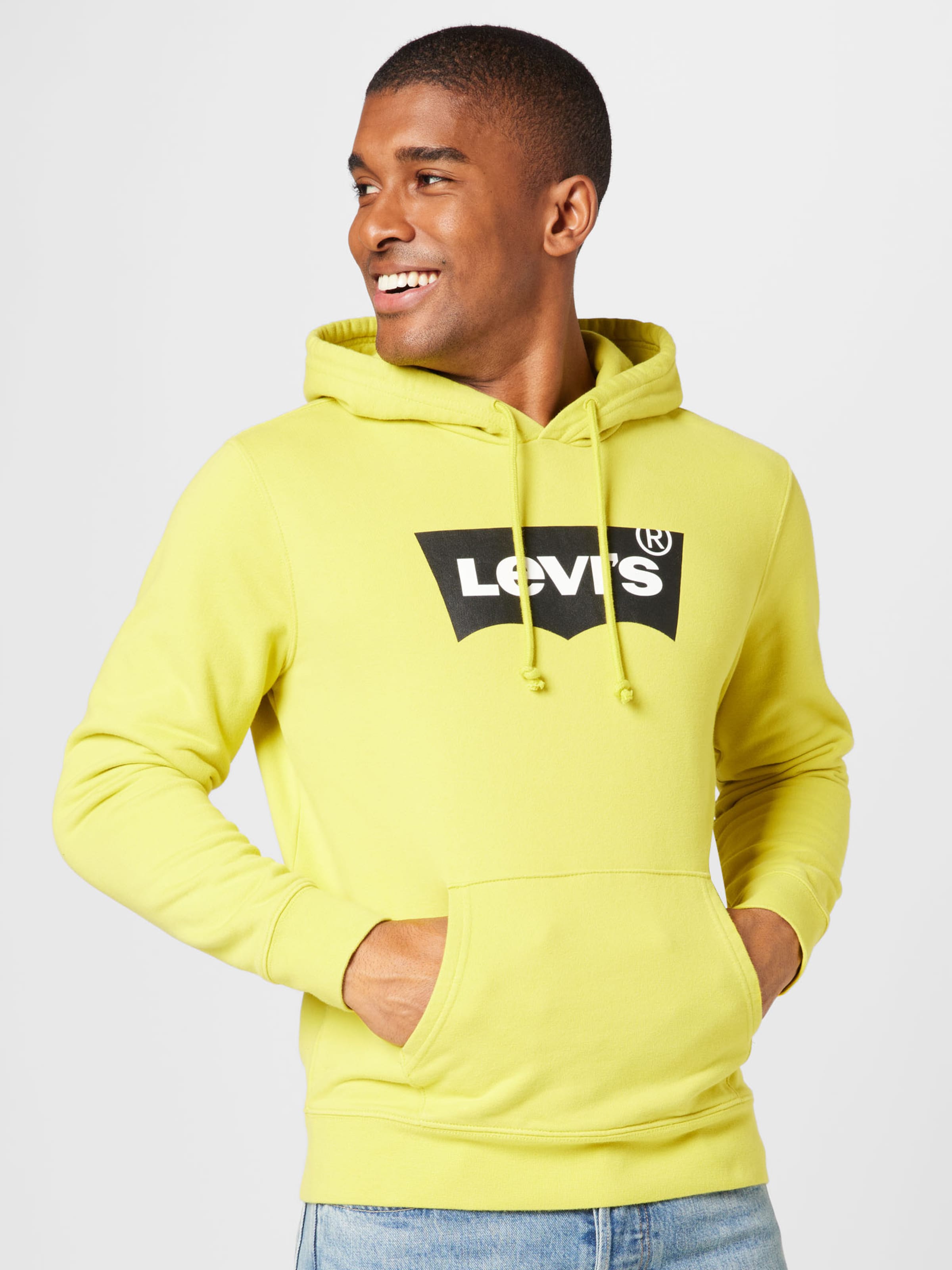 LEVI'S Sweatshirt 'STANDARD GRAPHIC HOODIE YELLOWS/ORANGES' in Yellow |  ABOUT YOU