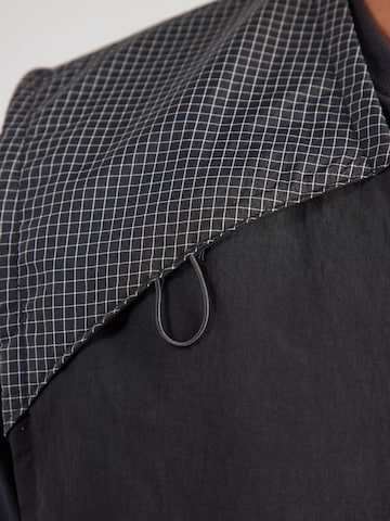 THE NORTH FACE Brezrokavnik | črna barva