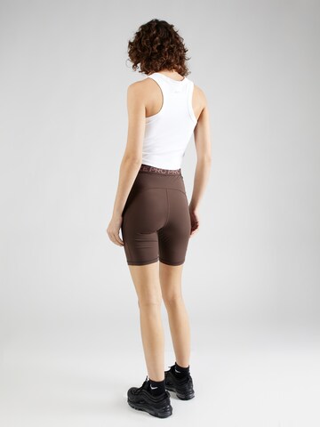 Skinny Pantalon de sport 'Pro 365' NIKE en marron