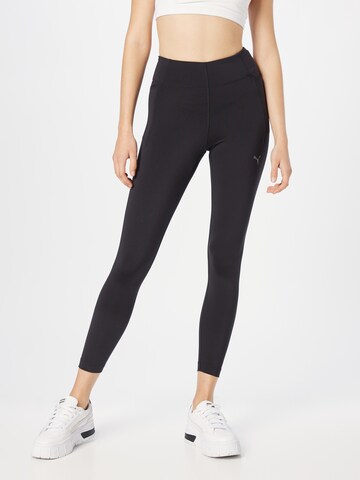 PUMA Slim fit Sports trousers in Black: front
